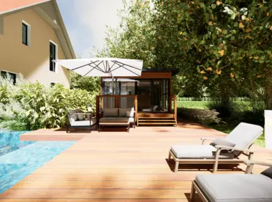 studio de jardin installé proche d'une piscine avec aménagement extérieur terrasse avec barrière et escalier 3 marches