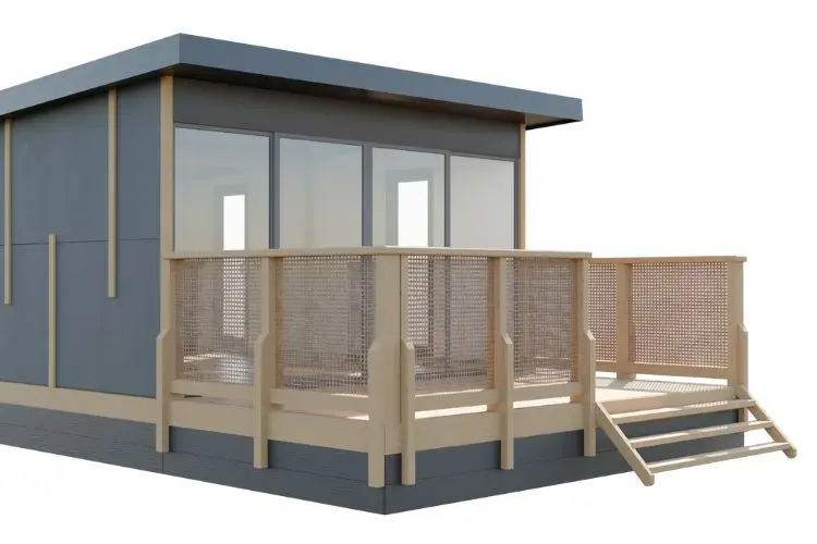 Délimitation de la terrasse de studio avec une barrière en bois & filet