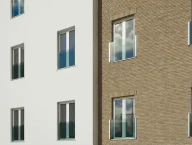 Balustrade en verre installé entre murs et en applique sur façade d'immeuble