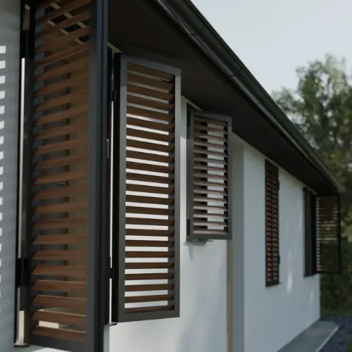 Brise-soleil orientable vertical détourné comme volet battant en aluminium et lames en bois thermodur sur une maison famililale pour l'isoler été comme hiver.