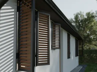 Volet battant aluminium gris anthracite et lames en bois thermodur installé sur une maison individuelle.