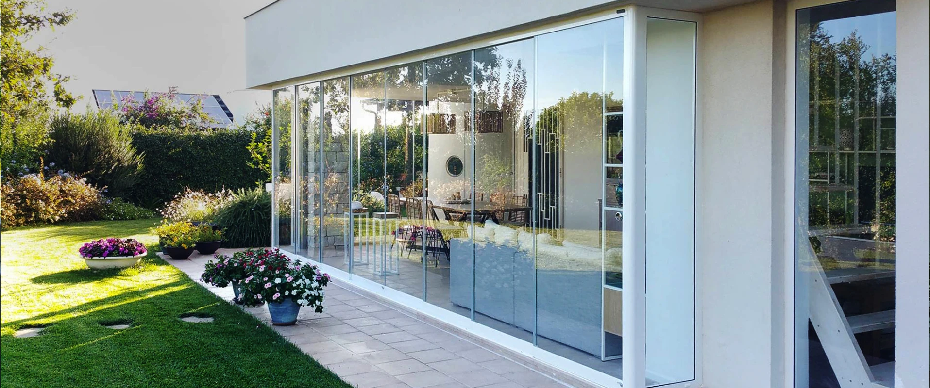 Fermerture de terrasse avec Coulissant Panoramique, cloison en verre d'extérieur Glass Systems